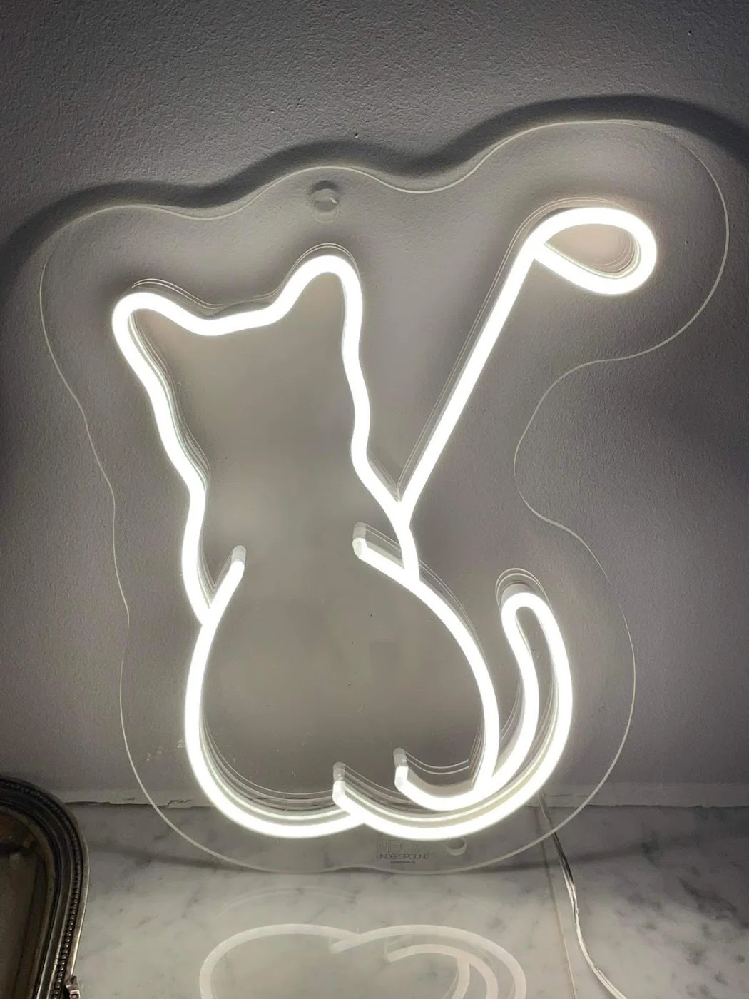 White LED neon cat sign — photo from the client’s Google review