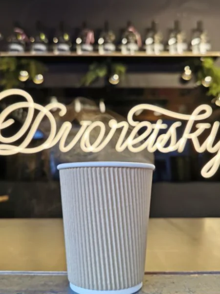 White script LED neon logo of a coffee roaster