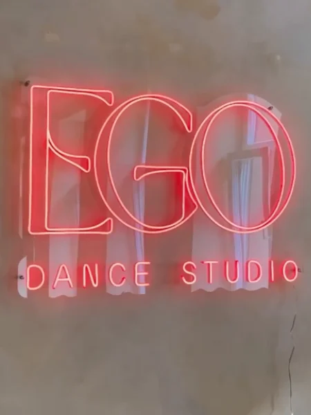 Red LED neon EGO Dance Studio logo