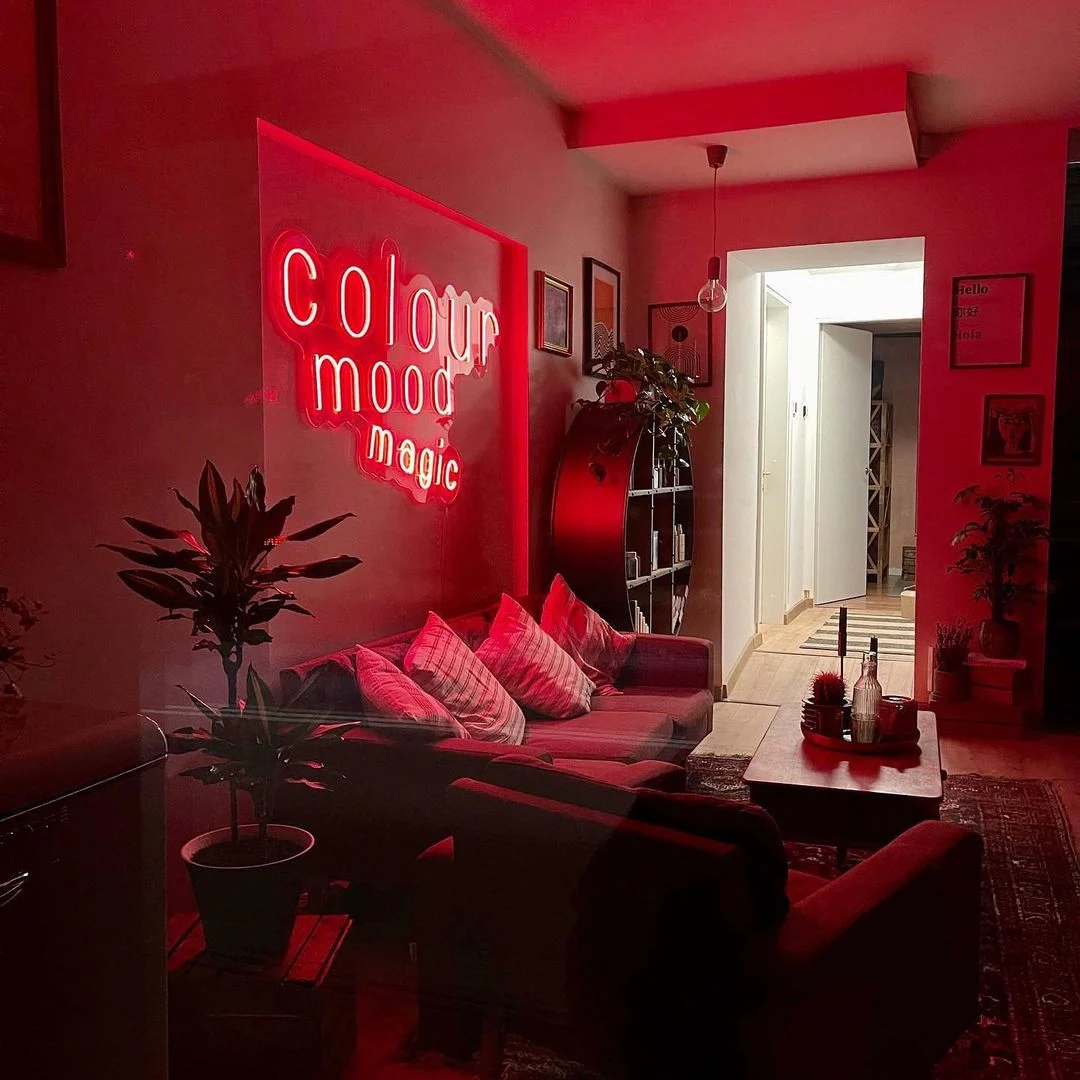 Red LED neon Colour Mood Magic sign in a living room