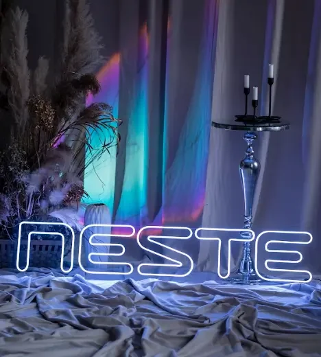 Blue LED neon Neste logo in a meeting room