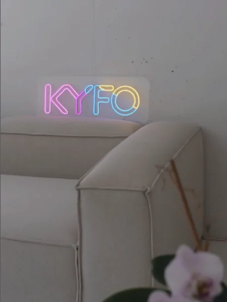 Pastel LED neon KYFO logo in a showroom